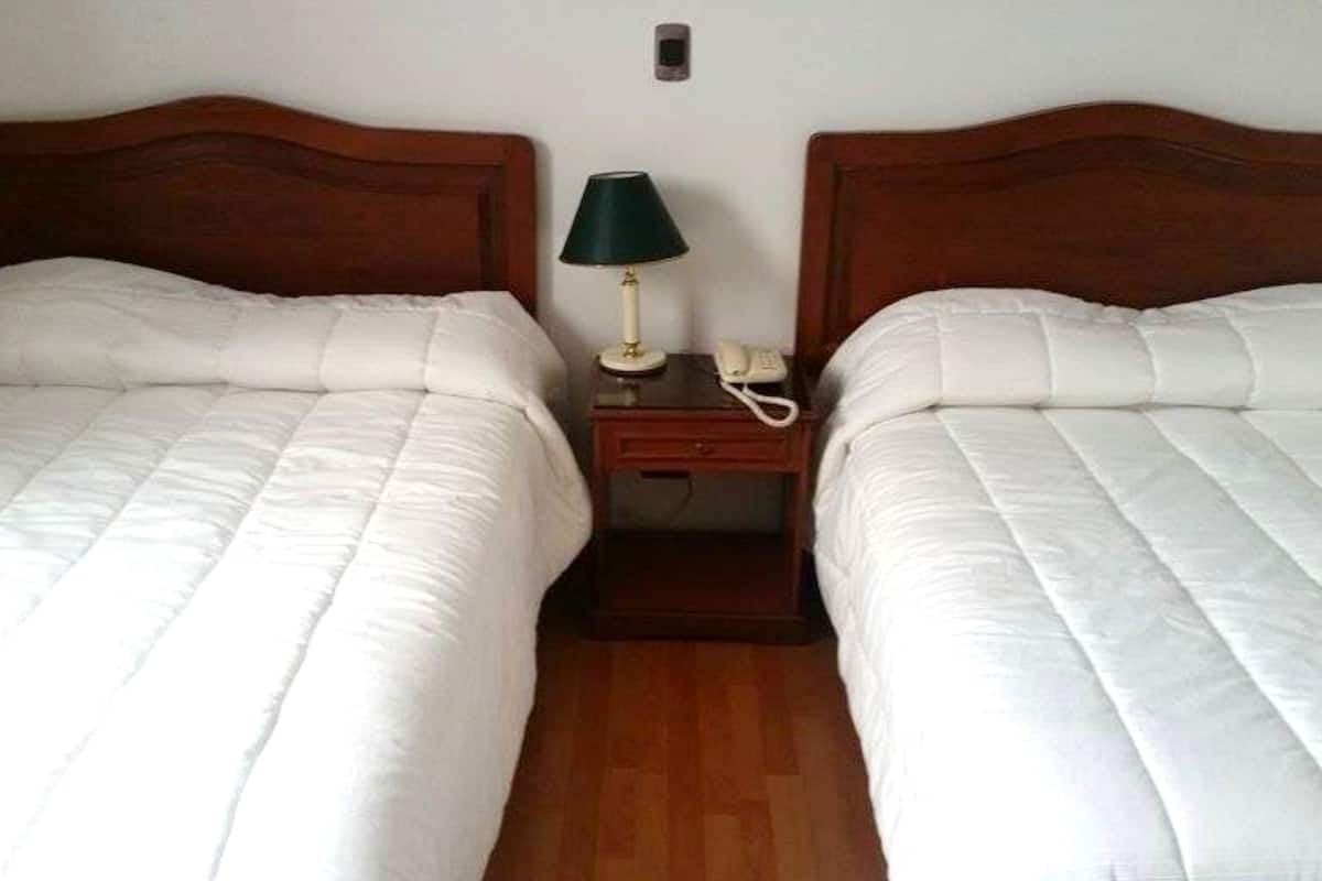 Twin Room | Minibar, in-room safe, desk, blackout curtains