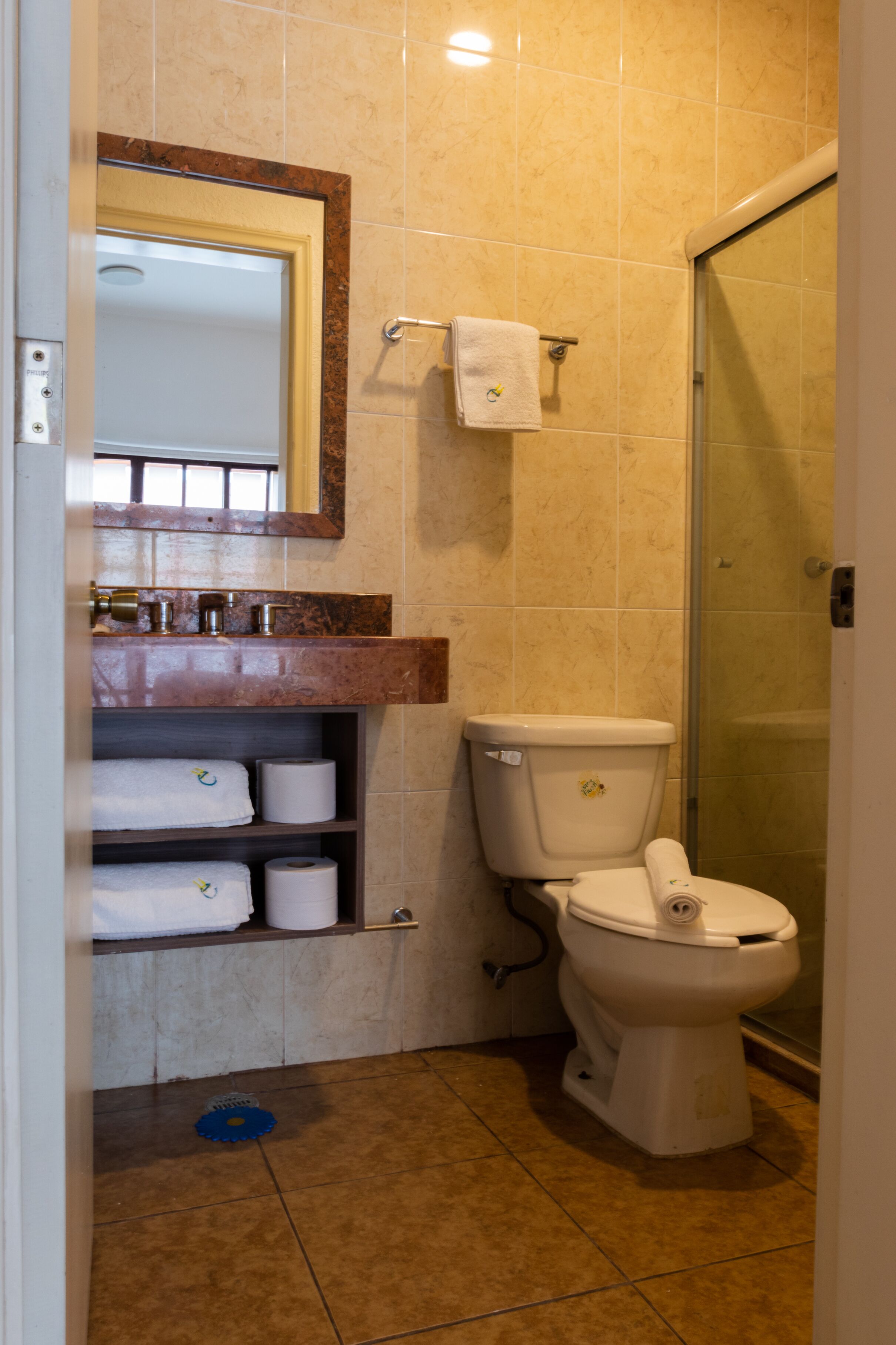 junior suite | bathroom | shower, rainfall showerhead, hair dryer, towels