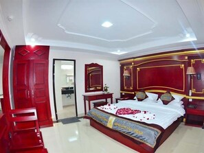 Suite ejecutiva | Minibar, caja de seguridad en la habitación y escritorio 