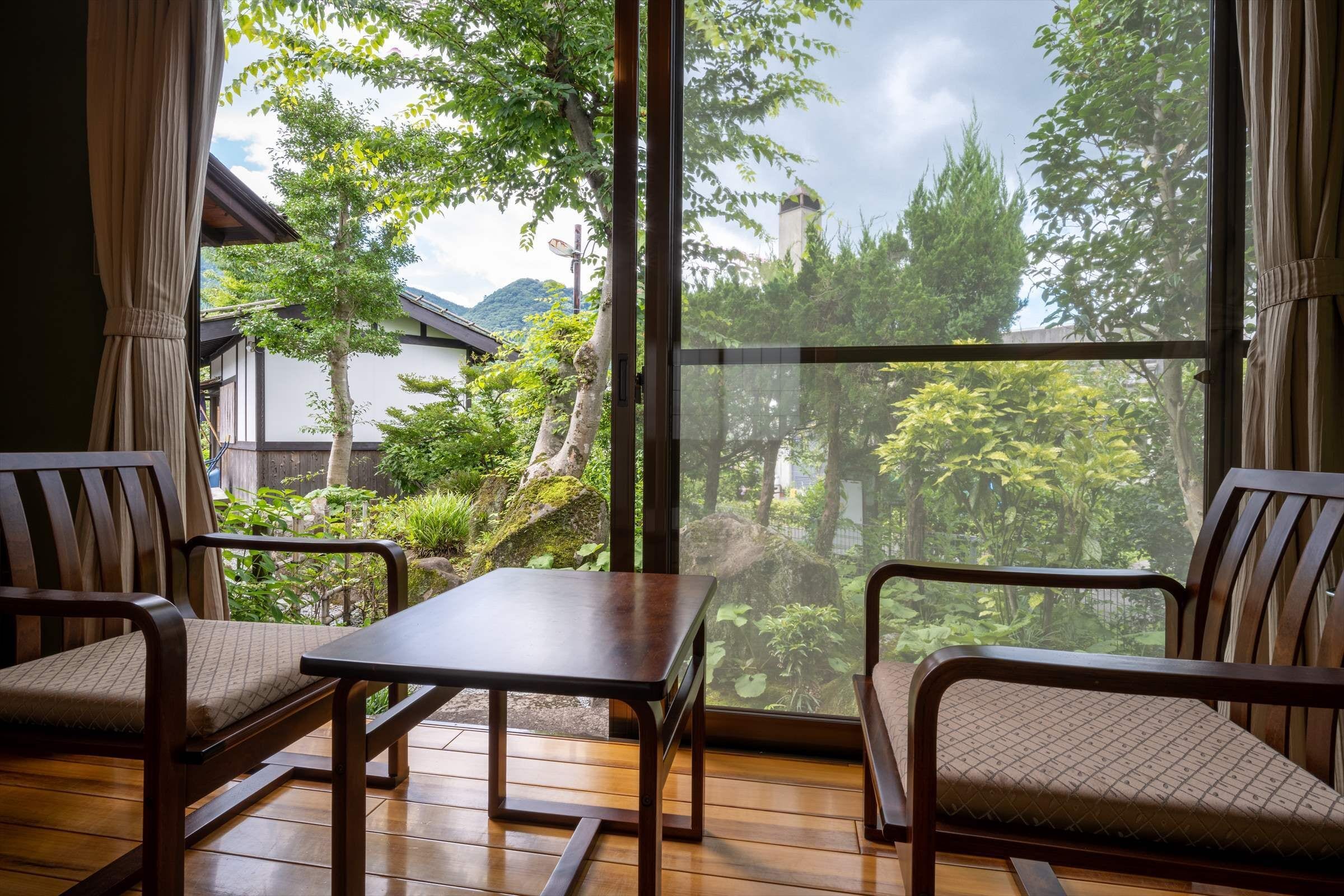 传统客房, 公共浴室 (Quadruple) | 羽绒被、客房内保险箱、熨斗/熨板、免费 WiFi