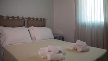 2 slaapkamers, Italiaanse Frette-lakens, luxe beddengoed, donsdekens