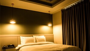 Suite | Ropa de cama de alta calidad y artículos del minibar gratis 