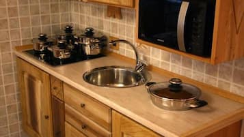 Suite Familiale, 2 chambres, coin cuisine, cÎté montagne | Coin cuisine privé