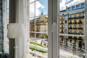 Double Room, City View | Desk, blackout drapes, iron/ironing board, cribs (free)