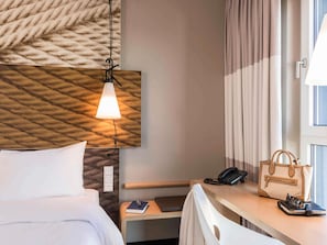 Hypo-allergenic bedding, in-room safe, desk, soundproofing