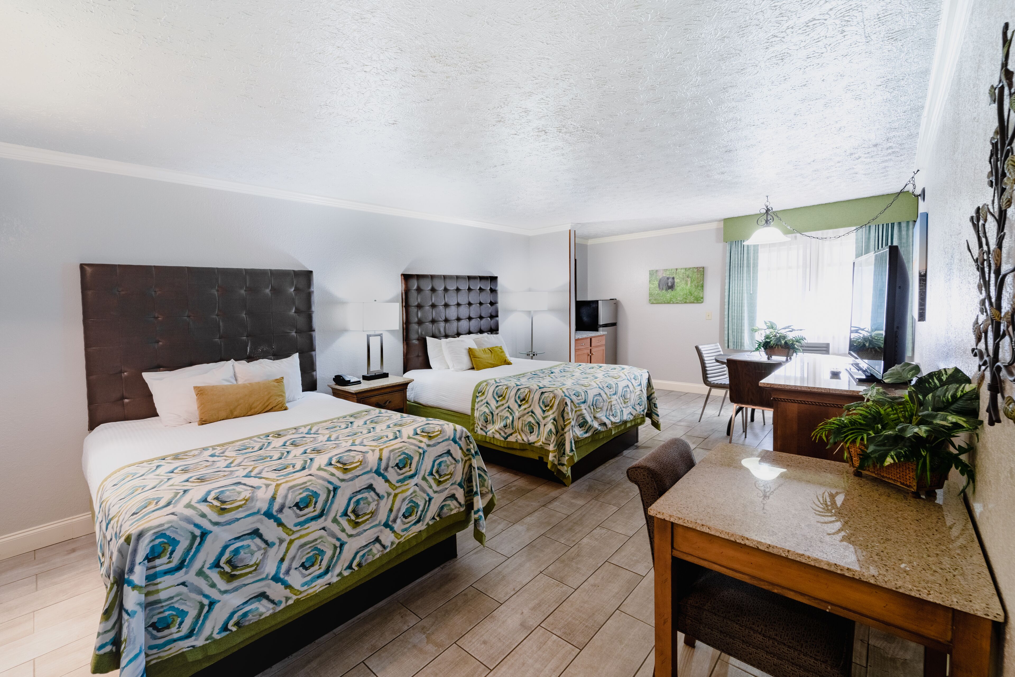 desk, laptop workspace, blackout curtains, iron/ironing board