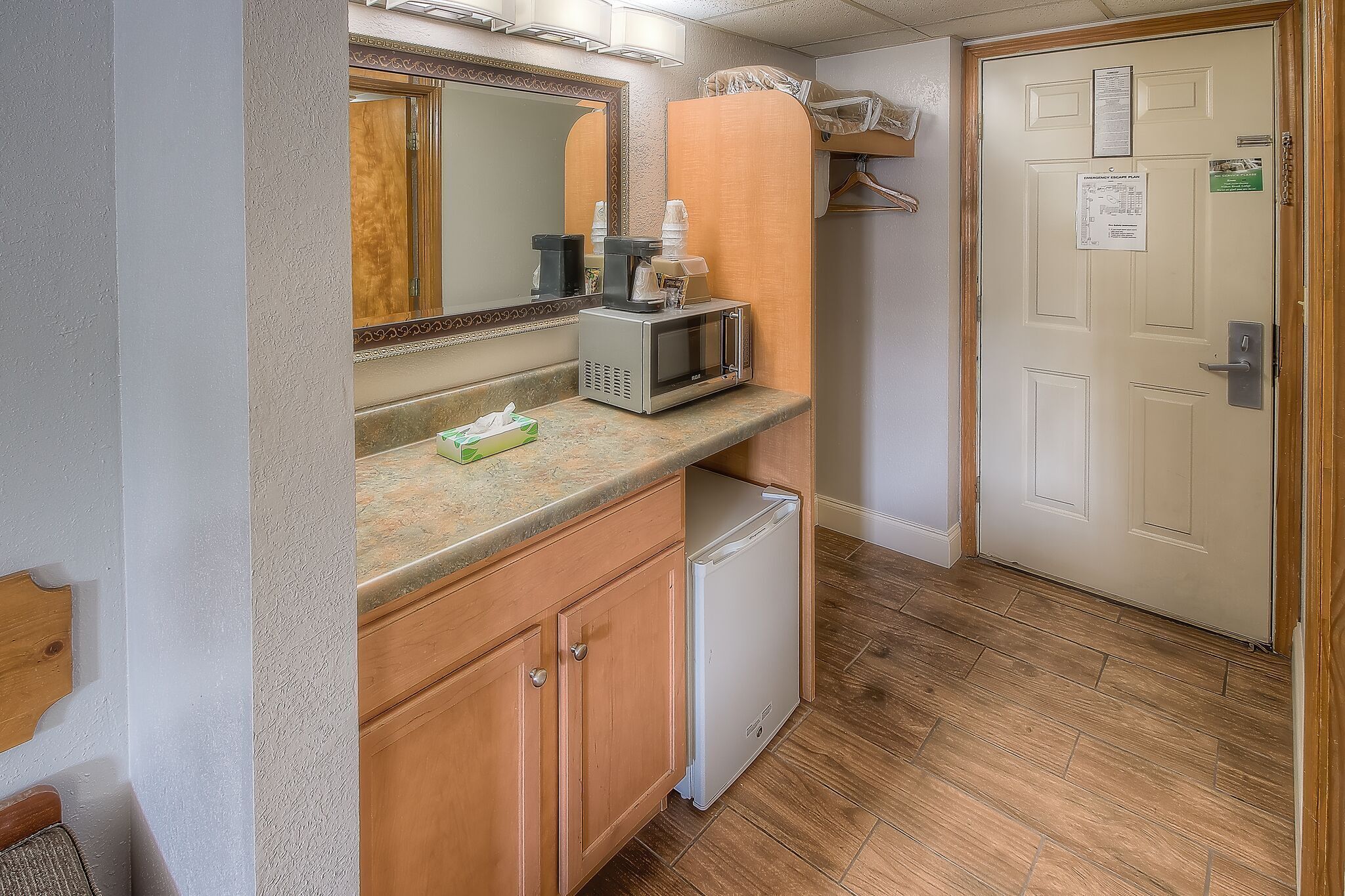 deluxe room, 2 queen beds, pool view | desk, laptop workspace, blackout curtains, iron/ironing board