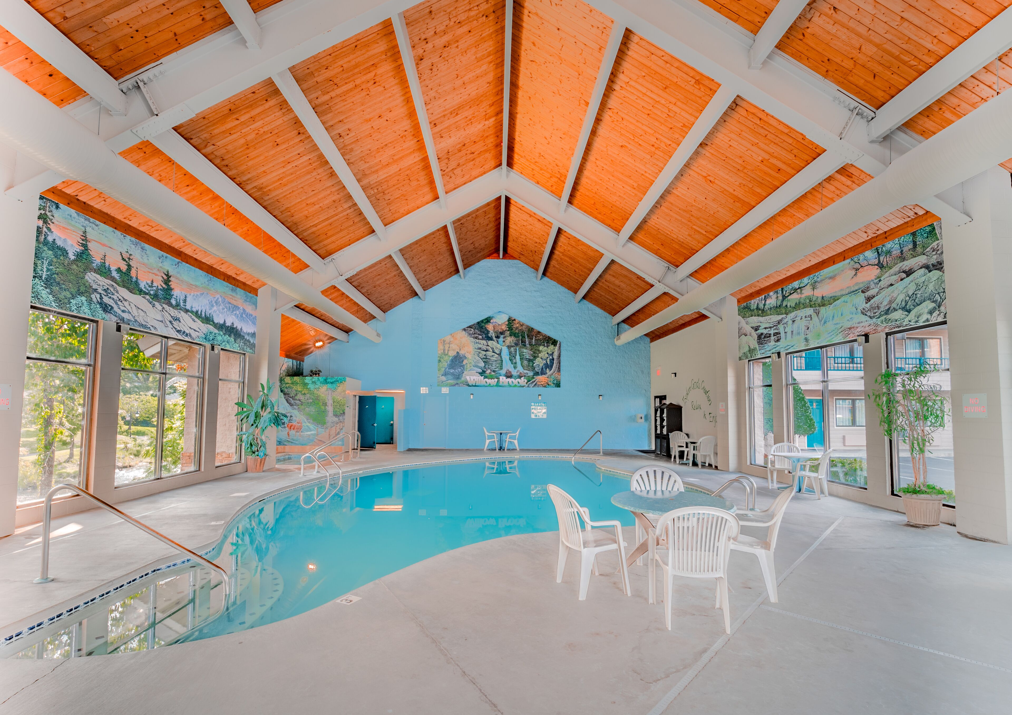 indoor pool, seasonal outdoor pool, pool umbrellas, pool loungers