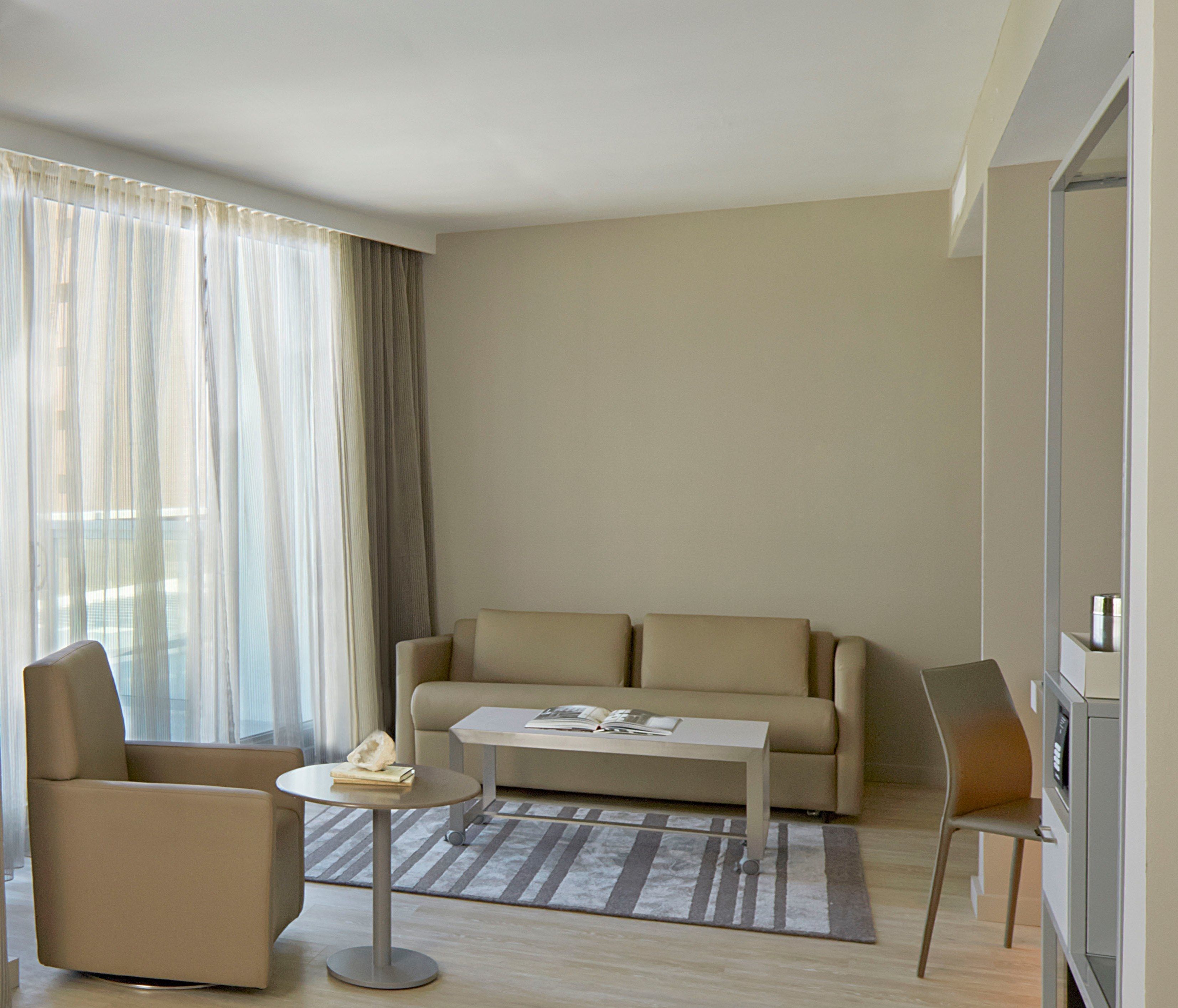 room, 1 king bed, balcony, ocean view | living area | 40-inch flat-screen tv with satellite channels, tv, netflix