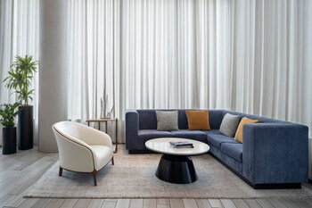 Sitting area in hotel lobby at AC Hotel by Marriott Miami Beach