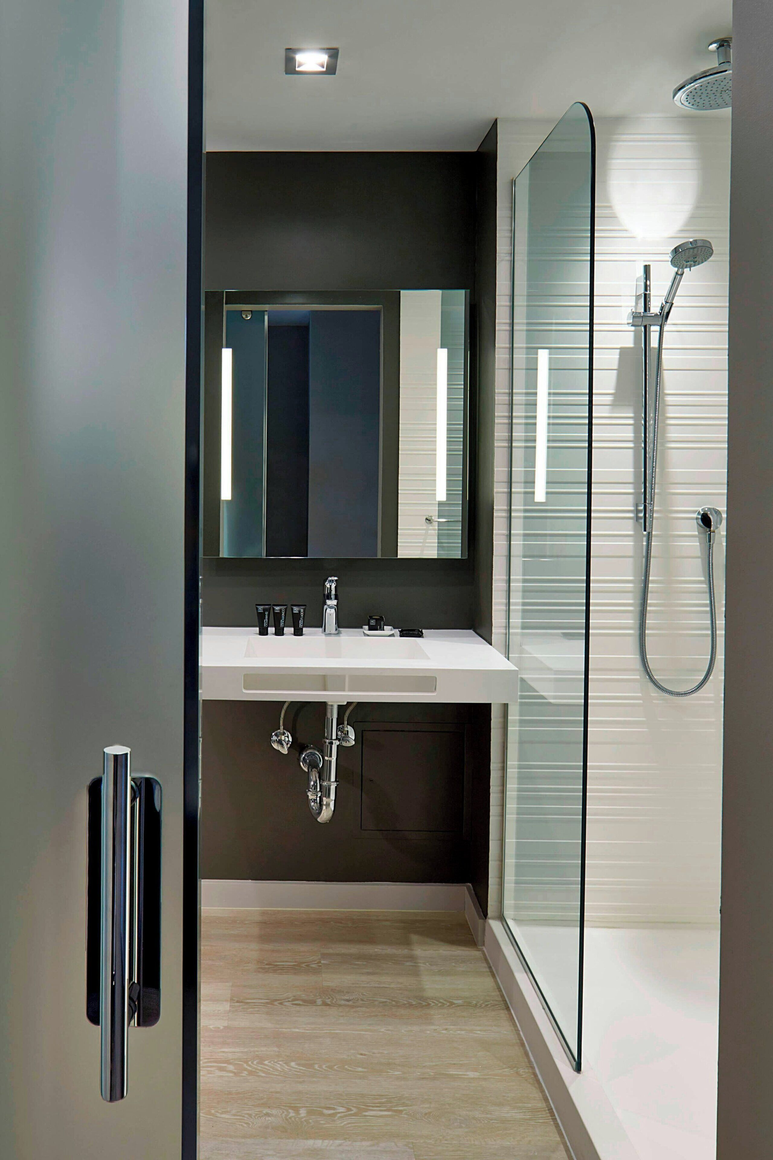 room, 2 queen beds | bathroom | free toiletries, hair dryer, towels, soap