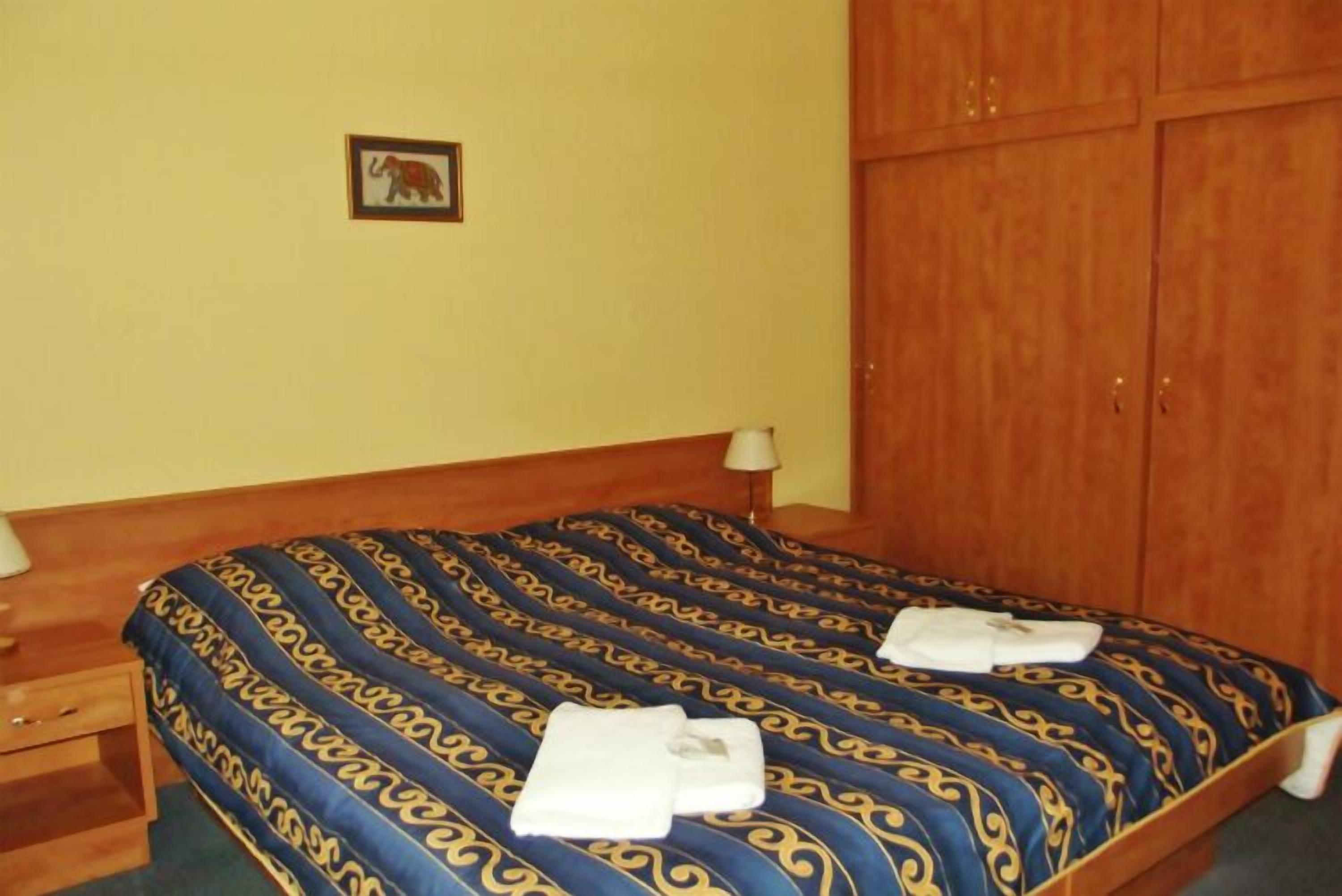 double or twin room | in-room safe, desk, blackout curtains, free wifi