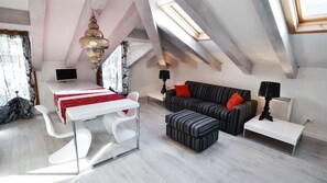 Apartment, 1 Bedroom (4 pax) | Living area | Flat-screen TV