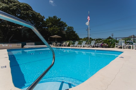 Outdoor pool, pool umbrellas, sun loungers