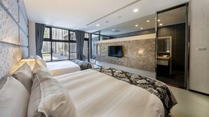 A modern hotel room with two beds, a large window, a flat-screen TV, and a bathroom visible through a glass door. - Tai Yi Red Maple Resort (Puli)