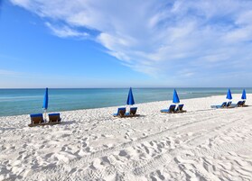 On the beach, white sand, beach towels