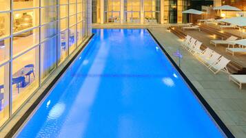 Seasonal outdoor pool, open 9 AM to 6 PM, sun loungers