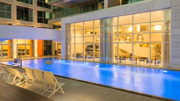 Seasonal outdoor pool, open 9 AM to 6 PM, pool loungers