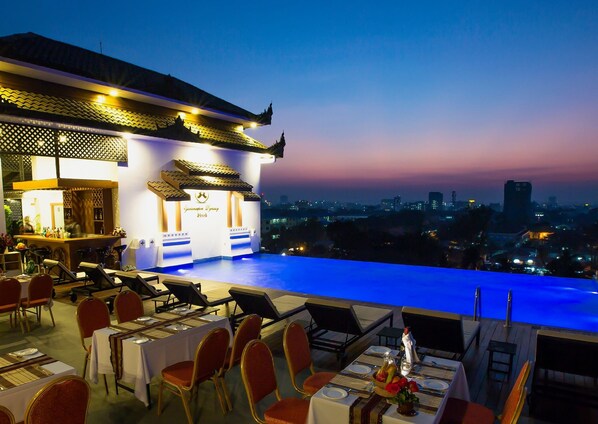 Outdoor pool, an infinity pool, open 6 AM to 7 PM, pool umbrellas - Yadanarpon Dynasty Hotel (Mandalay)