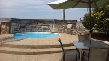 Indoor pool, seasonal outdoor pool, pool umbrellas, pool loungers