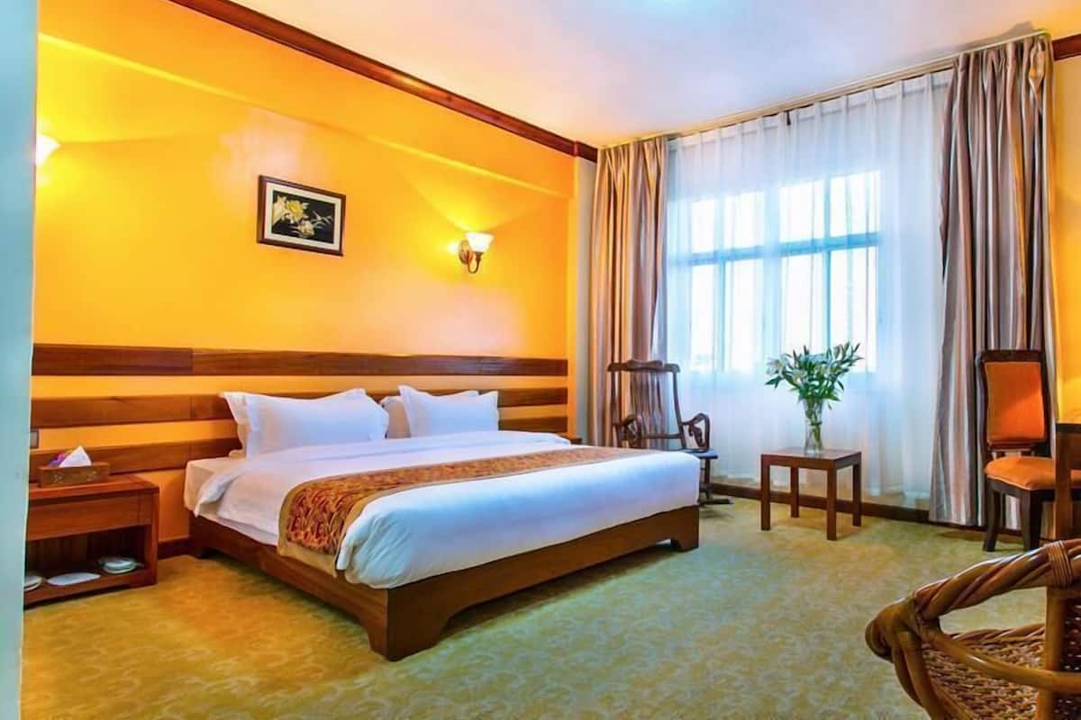 Egyptian cotton sheets, premium bedding, minibar, in-room safe