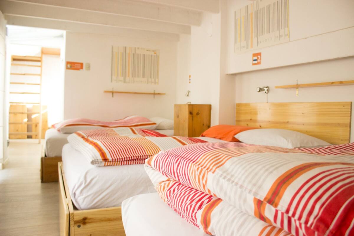Family Suite, Multiple Beds, Private Bathroom | Free WiFi, bed sheets
