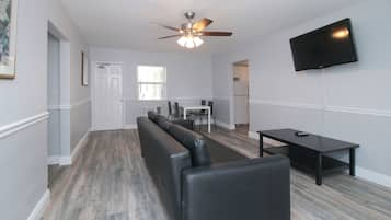 Suite, 1 Bedroom (101) | Living area | TV