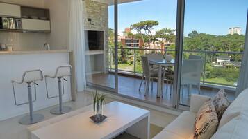 Superior Apartment, 1 Queen Bed, Garden View | Living area | 32-inch flat-screen TV with cable channels, LED TV