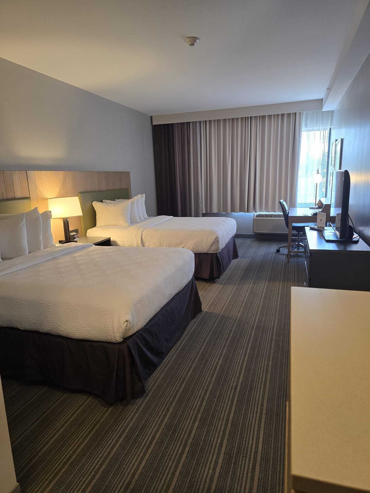 Room, 2 Queen Beds, Non Smoking | Desk, laptop workspace, blackout drapes, iron/ironing board