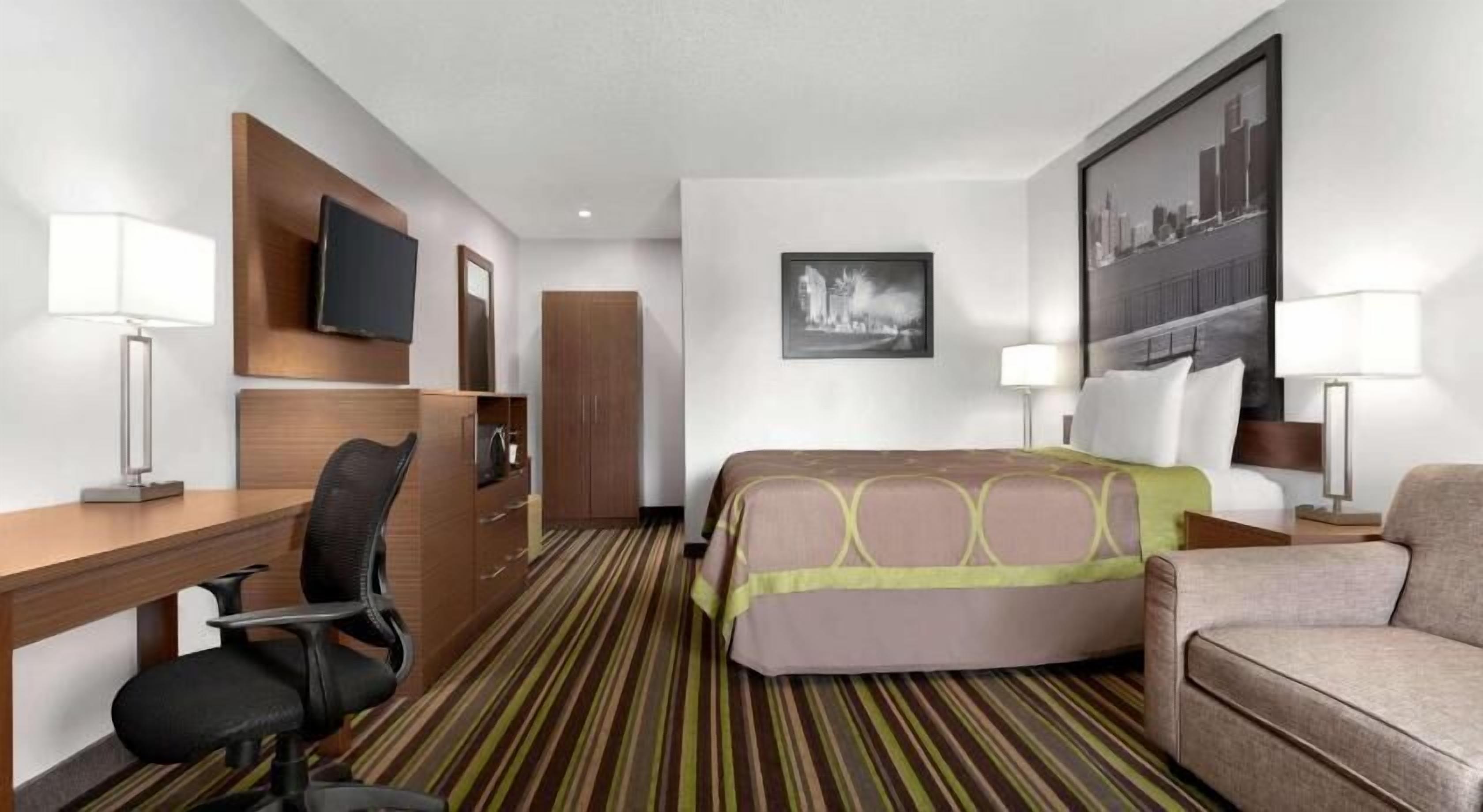 Minibar, desk, blackout drapes, iron/ironing board