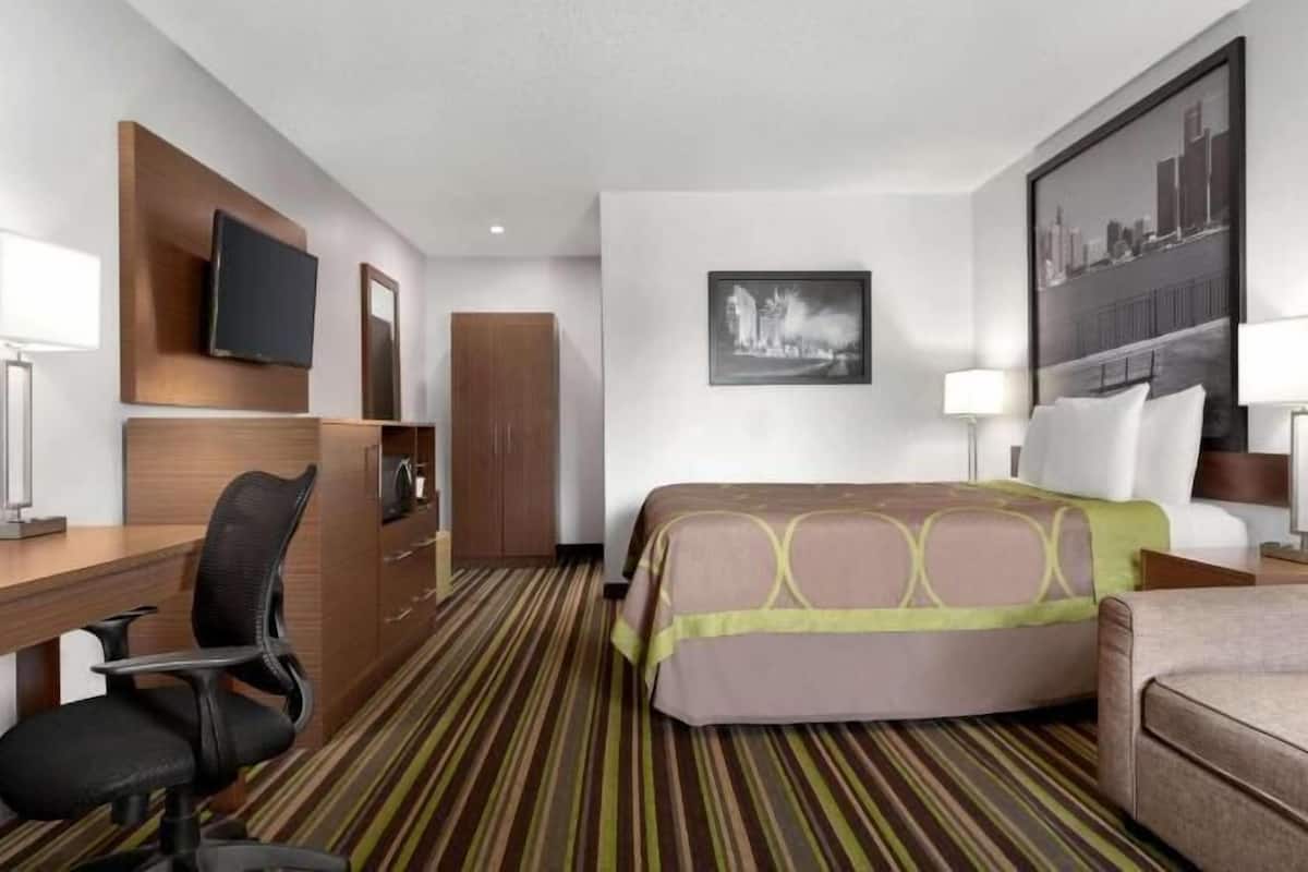 Minibar, desk, blackout drapes, iron/ironing board