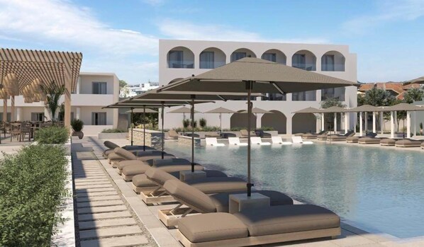 Alberca al aire libre y sombrillas en la alberca