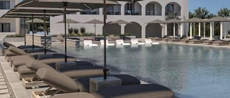 Piscine extérieure, parasols de plage
