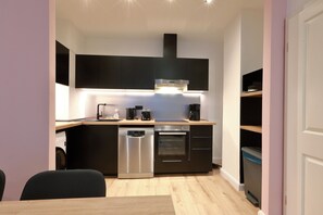 Standard Condo, 1 Bedroom (Excluding 85 Euro Cleaning Fee) | Private kitchen | Fridge, microwave, coffee/tea maker, dining tables - Hevals Grand Schöneberg (Berlin)