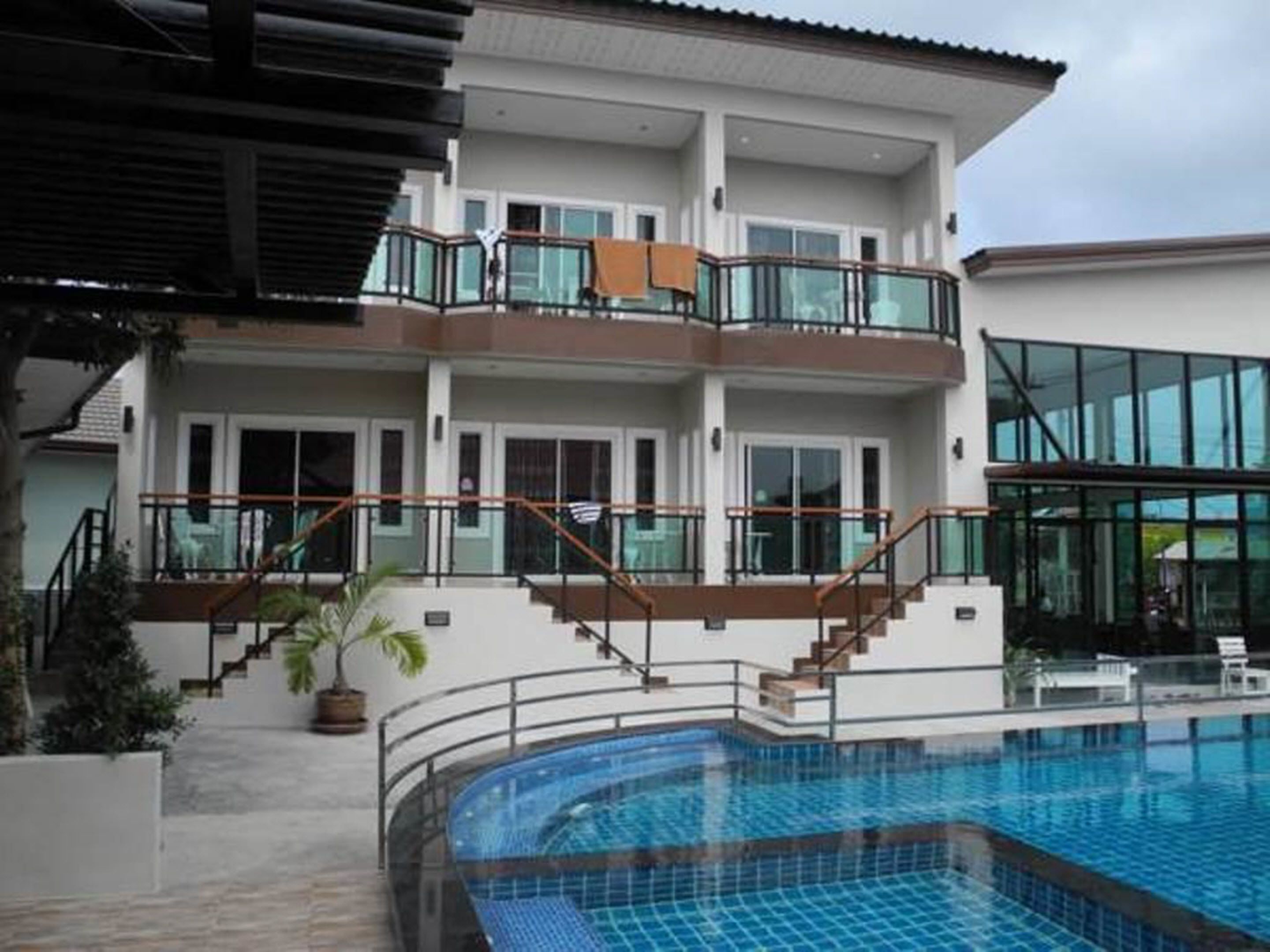 outdoor pool, pool umbrellas, pool loungers