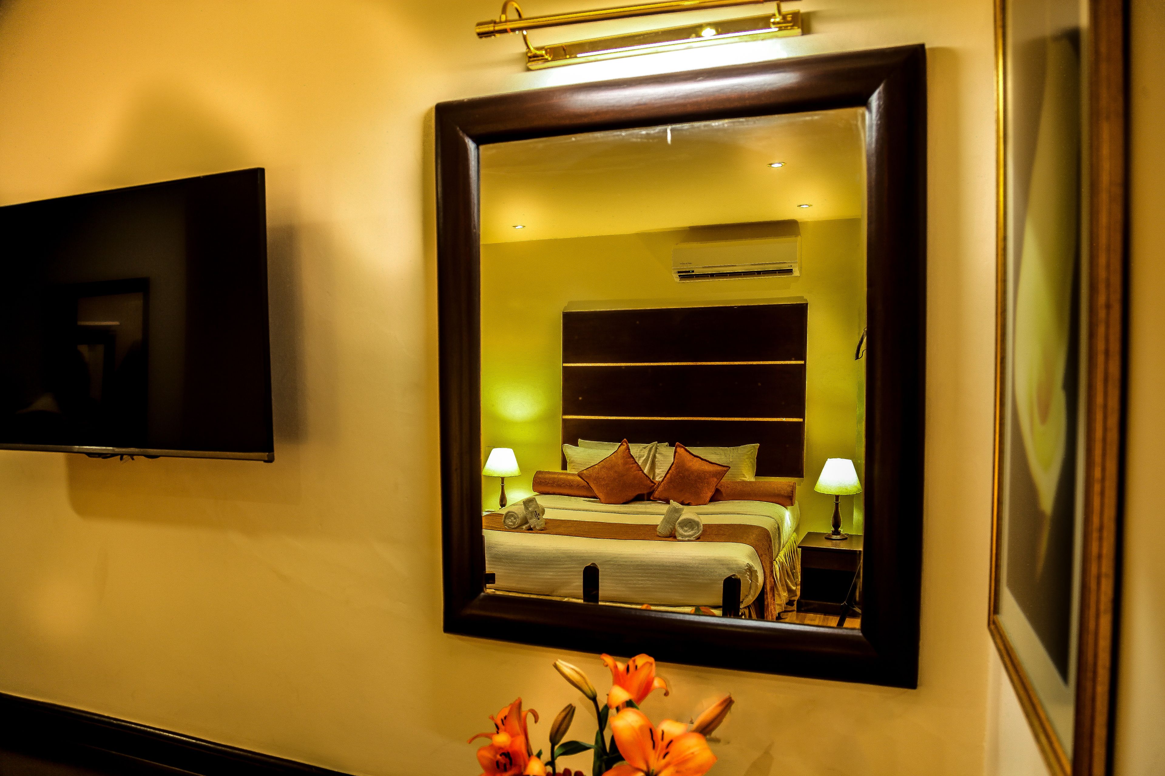 deluxe room | 1 bedroom, premium bedding, in-room safe, desk