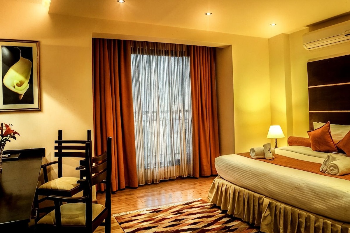 Premium bedding, in-room safe, desk, soundproofing