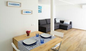 Family Bungalow, 2 Bedrooms, Sea View (3 Adults + 2 Children) | Living room | Flat-screen TV - Le Palme Village (Terracina)