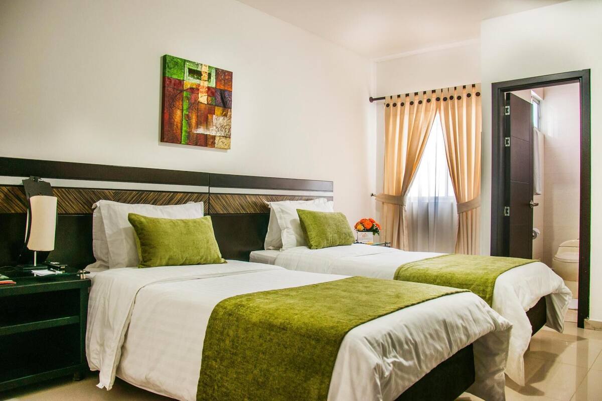 In-room safe, desk, blackout curtains, iron/ironing board (on request)
