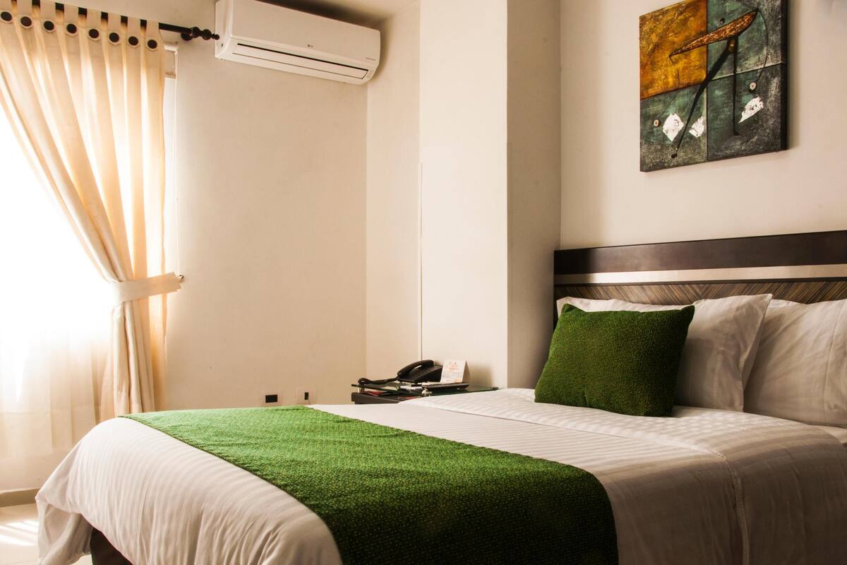 In-room safe, desk, blackout curtains, iron/ironing board (on request)