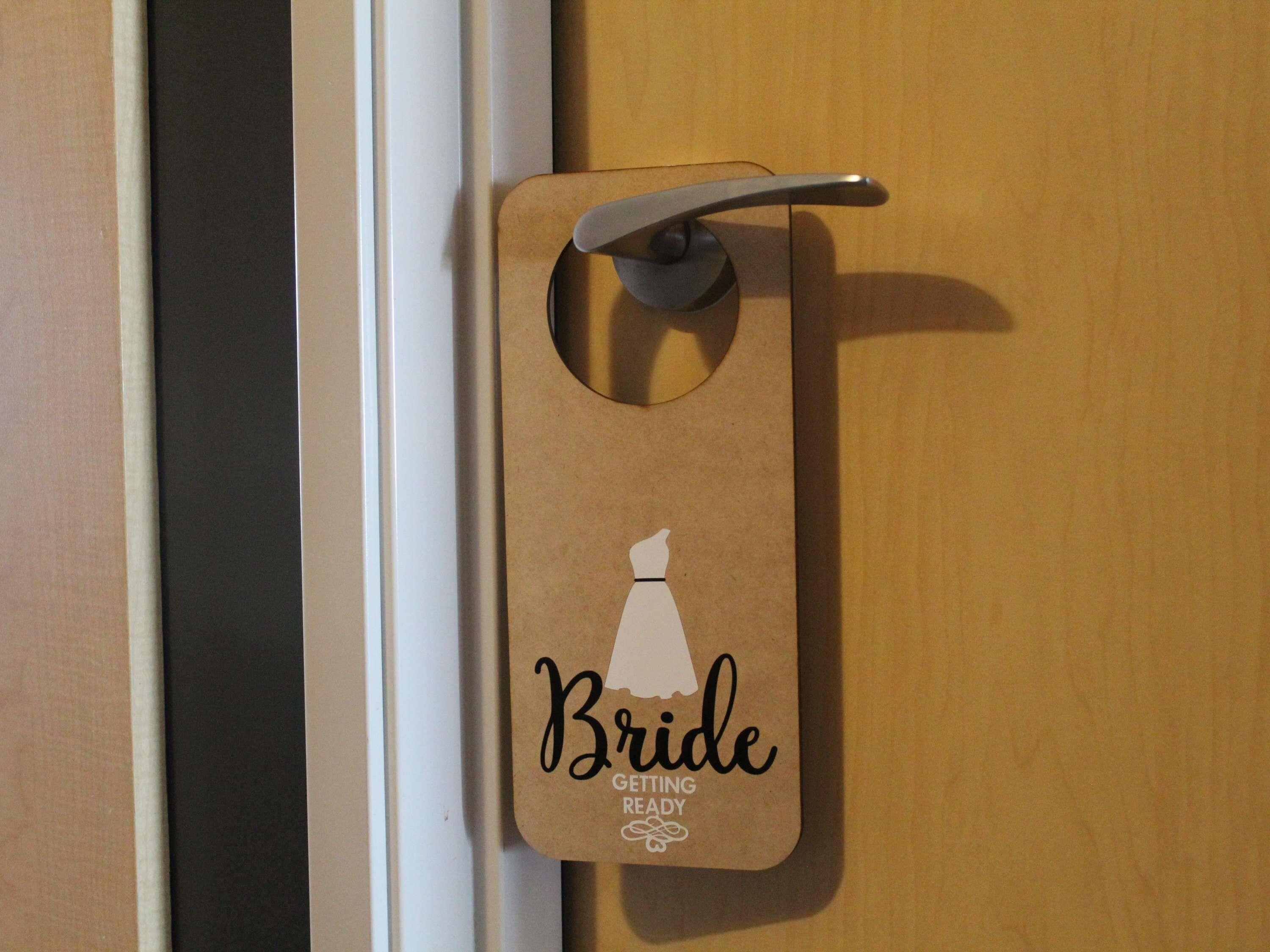 A door with a 'Bride Getting Ready' sign.