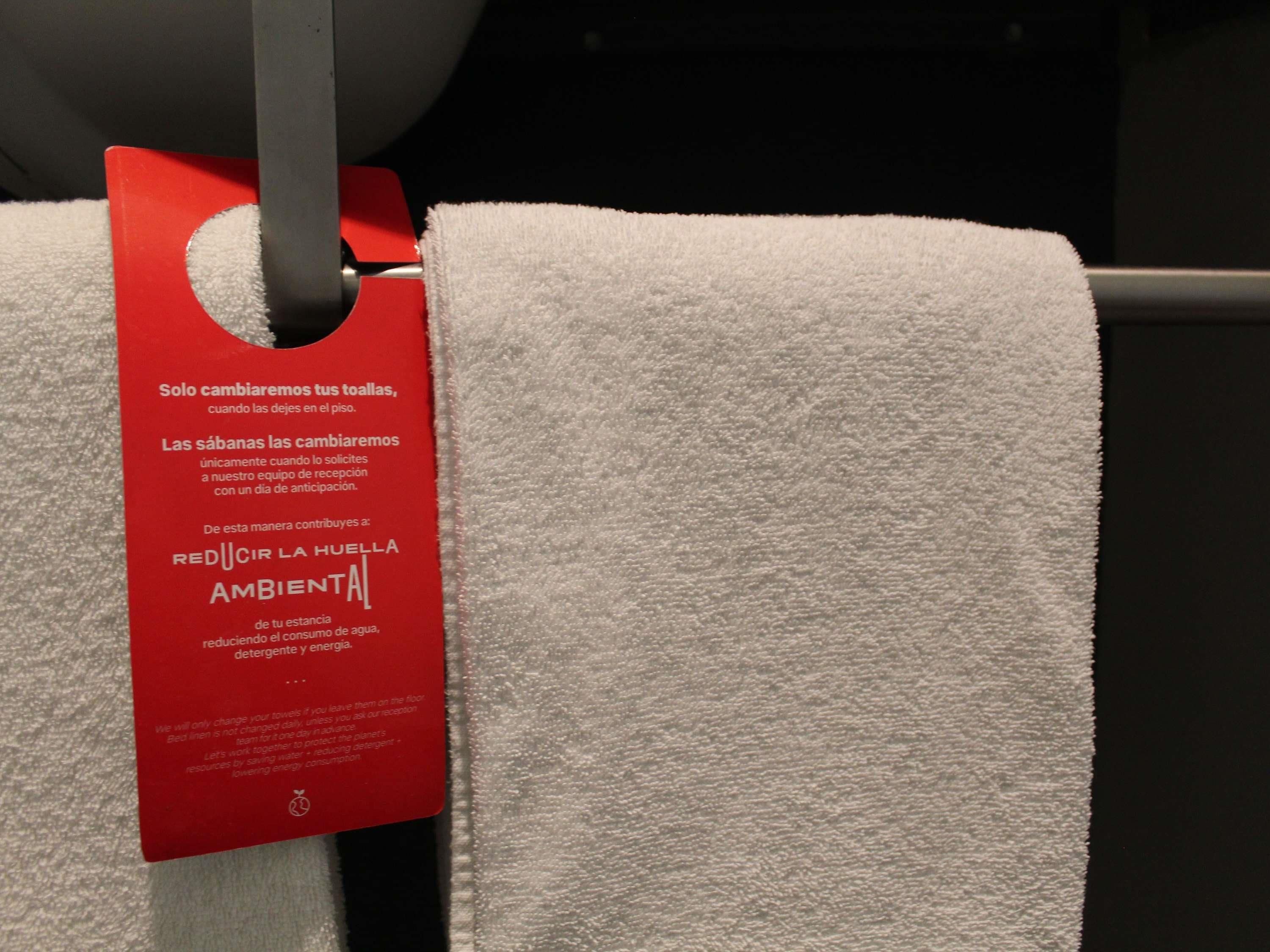 A towel with a red tag attached to it.