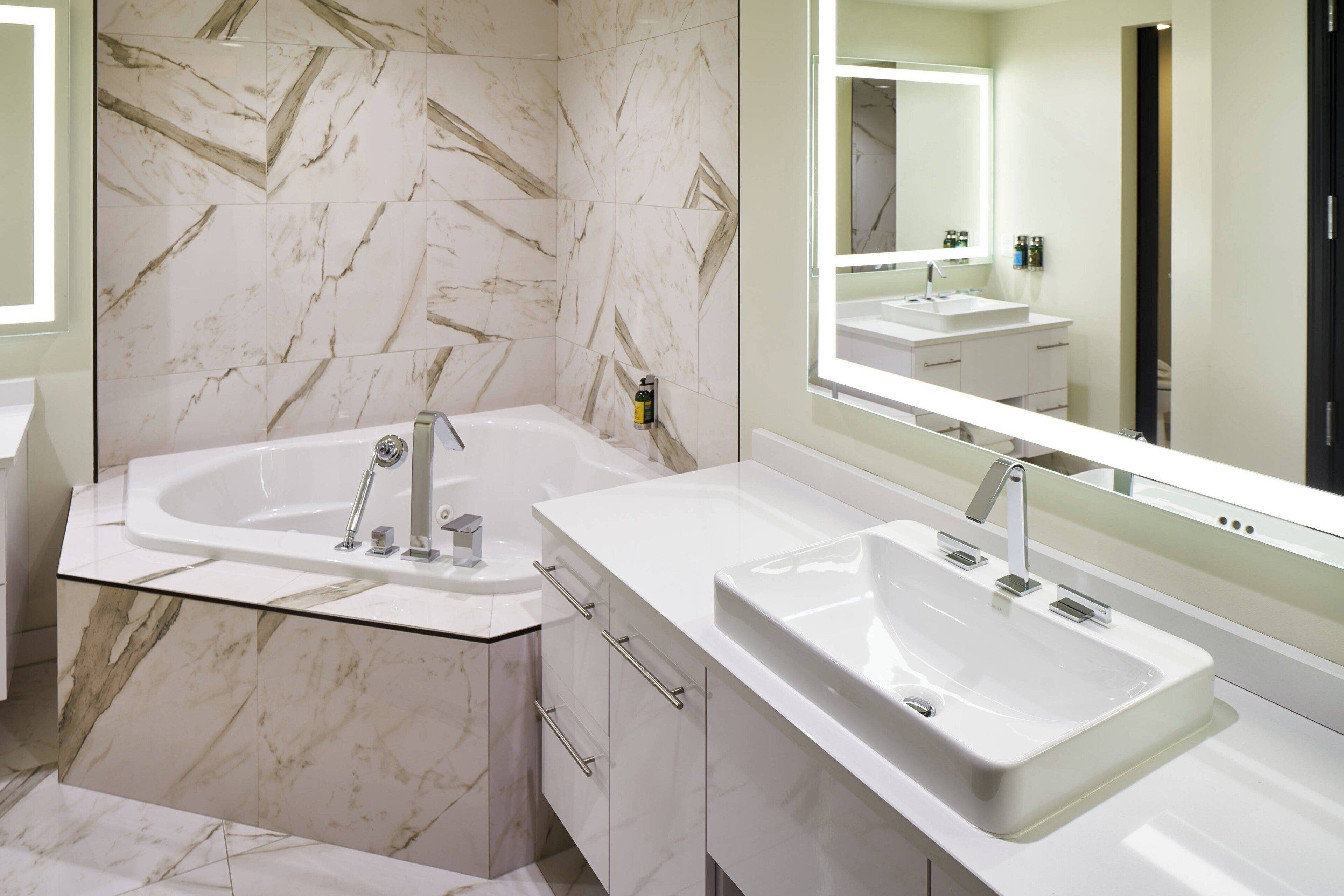 designer toiletries, hair dryer, bathrobes, towels