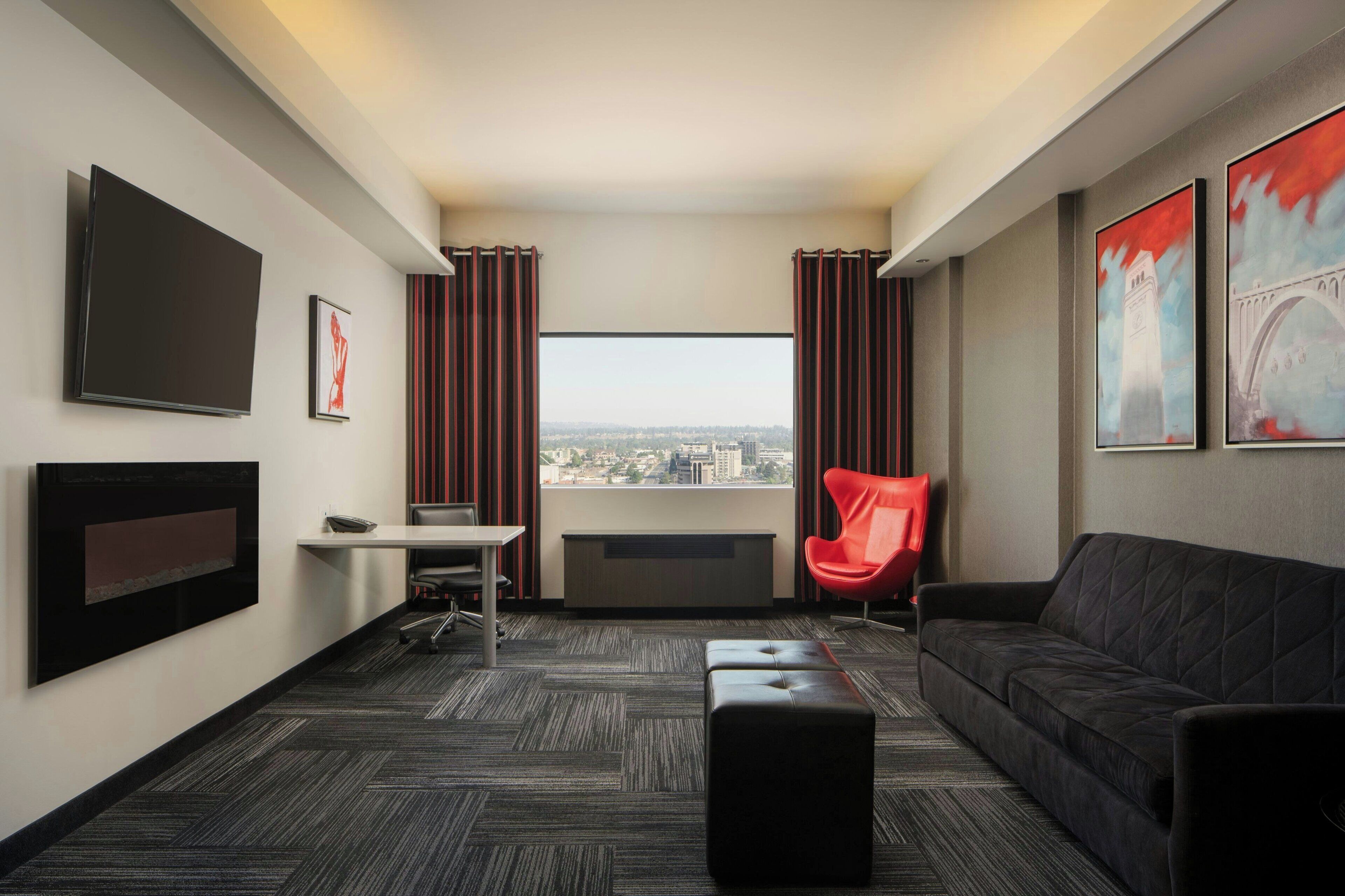 penthouse, 1 king bed with sofa bed, fireplace | living area | 55-inch lcd tv with digital channels, tv, pay films