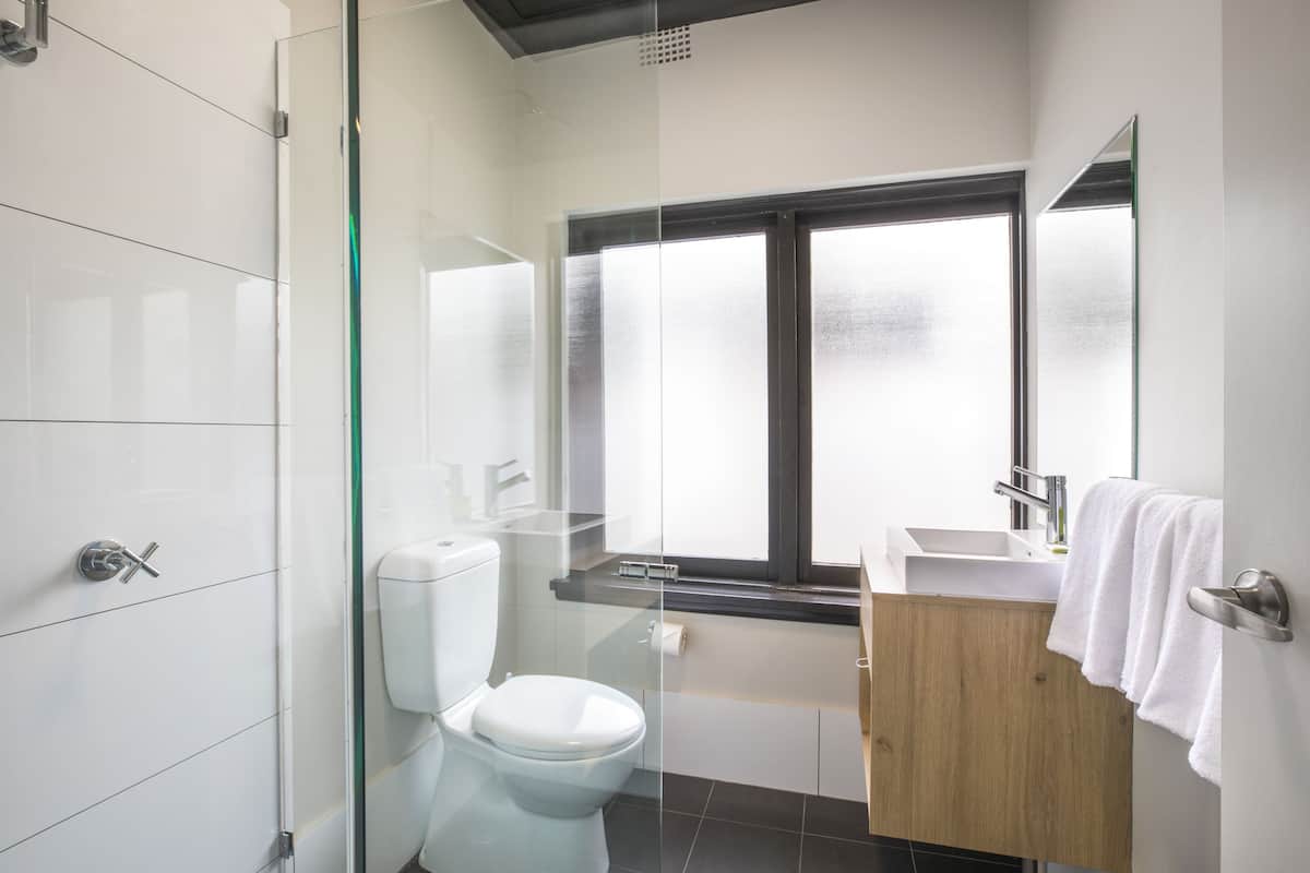 studio queen | bathroom | shower, rainfall showerhead, free toiletries, hair dryer