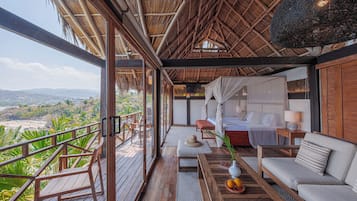 Grand Luna Suite King | Zona de estar | Smart TV de 40 pulgadas con canales digitales