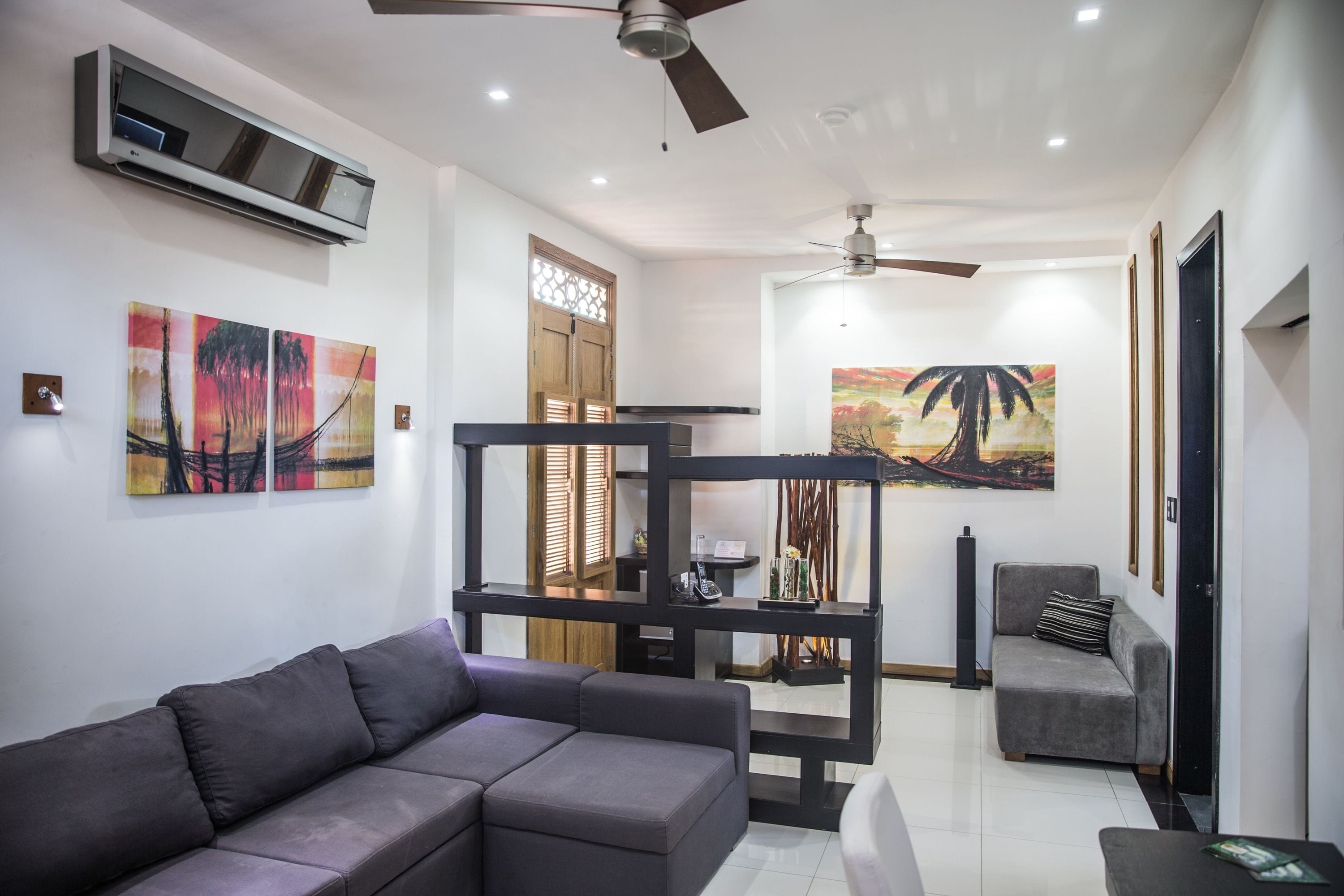 suite | living area | 32-inch lcd tv with satellite channels, tv, tablet