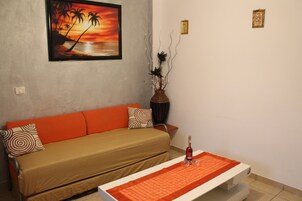 Superior Apartment, 1 Bedroom | Living area | LCD TV