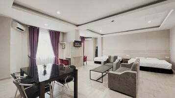 Minibar, desk, bed sheets