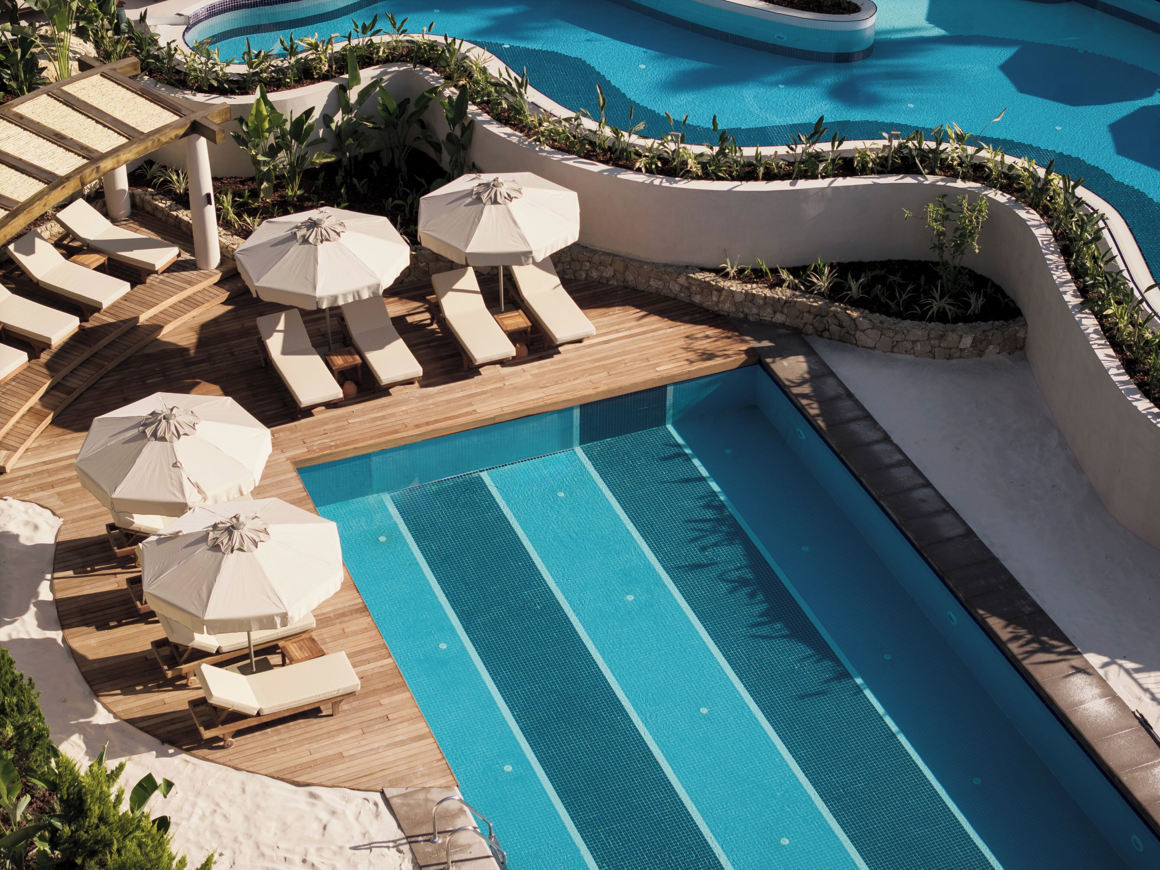 Indoor pool, 2 outdoor pools, open 9:00 AM to 7:00 PM, pool umbrellas